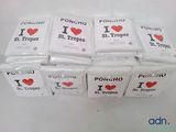 several packets of i love pocho and st tropes on a table