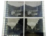 three black and white photos of a street with buildings and mountains in the background