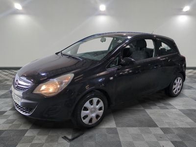 a picture of a black car parked in a garage