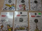 several comics are lined up on a table in front of each other