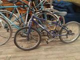 two bikes parked next to each other on the floor