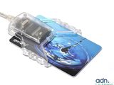 an image of a cell phone with a card attached to it