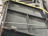 an image of a boat being built in a warehouse