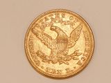 an image of a gold coin with a eagle on it