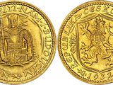 une pièce d'or « sovereign » représentant un homme tenant une épée