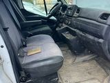 the interior of a truck with the driver ' s seat down