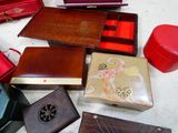 many different types of boxes and cases on the floor