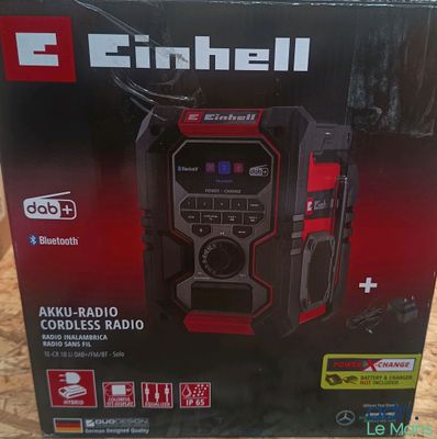 a close up of a box with a radio inside of it