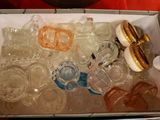a box full of plastic bottles and a hot dog in it