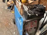 an image of a pile of junk in a garage