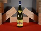 a bottle of wine that is sitting on a table