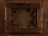 a wooden frame with a hole in the middle of it