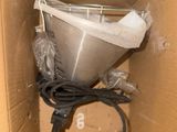a box that has a toilet in it inside of it