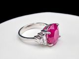 sterling silver ring with a pink stone and diamonds