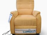 an image of a recliner chair with a remote control on it