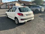 a white car that is parked in a parking lot
