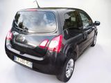 a picture of a small black car parked on a white surface