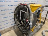 a hose that is attached to a cart in a room