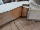 a close up of a piece of wood on a table