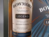 a bottle of bowmore legend whisky in a box