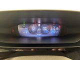 an image of a car dashboard with a digital display