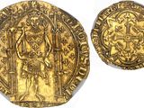 two gold coins, one of which has a man holding a sword and the other of which is holding a