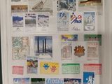 a refrigerator covered in many different types of magnets