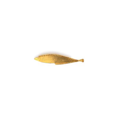 an image of a gold fish shaped object on a white background