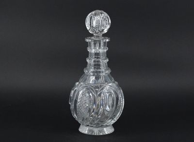 an image of a clear glass bottle on a black background