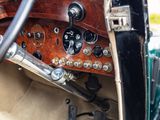 a close up of the dashboard of a vintage car