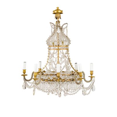 an image of a chandelier made of glass and brass
