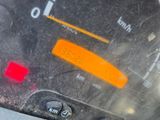 a close up of a car dashboard with a speedometer