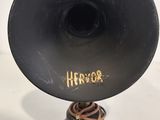 an old black hornphone with the word hervor on it