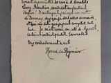 un gros plan d'un morceau de papier sur lequel on a écrit