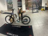 a motorbike that is sitting on a mat in a room