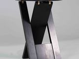 the table is made of wood and has a black top