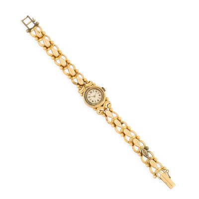 a close up of a wrist watch on a white background
