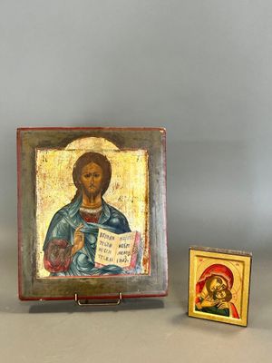 an image of a painting of jesus holding a book next to a small wooden box