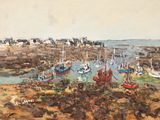 many boats that are sitting on the shore by the water