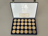an image of a box of gold coins on a table