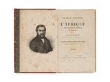 an old book with a picture of a man in a suit and tie