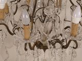 a chandelier with many lights hanging from it