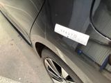 a sticker on the side of a car that says