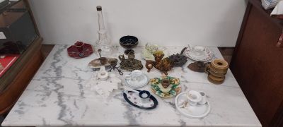 a marble table with a lot of items on top of it