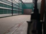 a train that is going down the tracks in the station