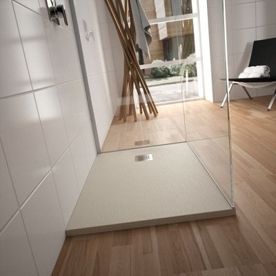 an image of a bathroom with a shower and a chair