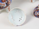 three vases that are sitting on a table