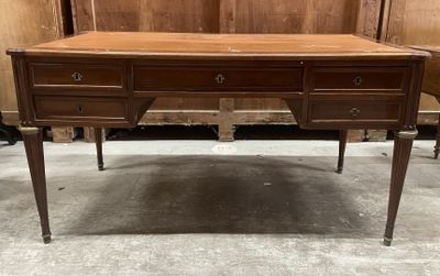 a wooden desk with two drawers and a drawer underneath it