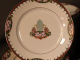 many plates stacked on top of each other on a table