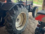 a tractor that is parked in a garage